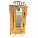 A Victorian bamboo and raffia corner wardrobe. 70 x 70 x 190cm.