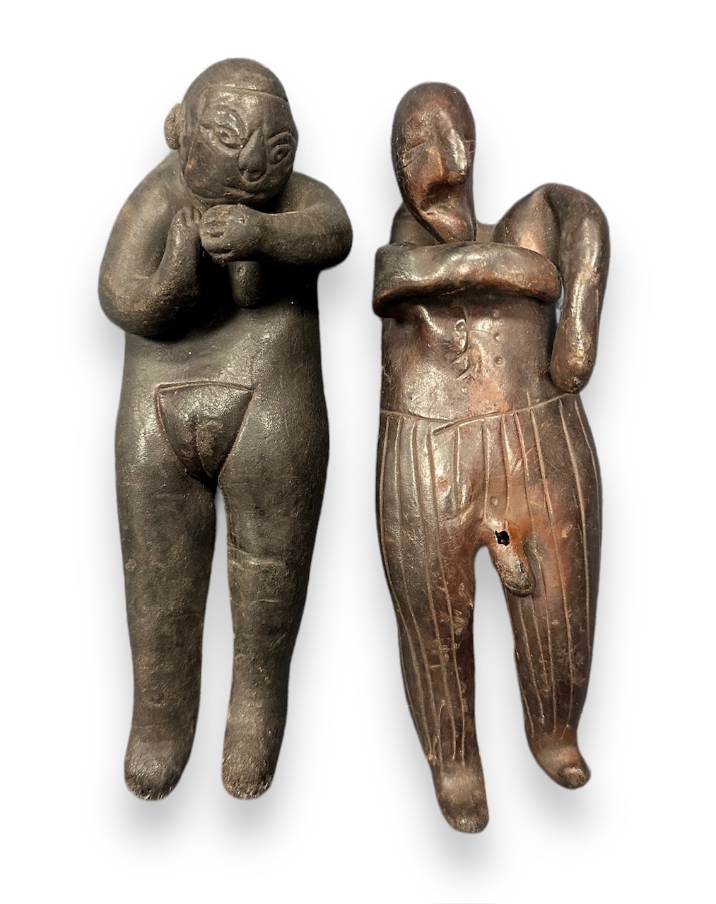 Traditional pair of African fertility sculptural figures / figurines, likely made of rubber and