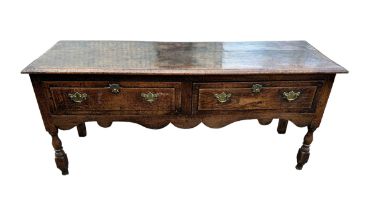 A 17th Century oak two drawer dresser base, w156cm, d47cm, h71cm.