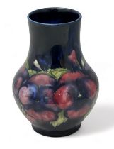 Moorcroft baluster shaped vase in the pansy pattern - impressed to base M74. 16.5cm high. Some