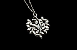 A Tiffany & Co silver 'olive leaf' pendant, designed by Paloma Picasso, on a signed and stamped