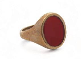 A 9ct gold Carnelian signet ring, size R. Marks for London 1965. Carnelian approx 15mm x 11mm.