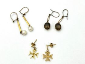 Three pairs of earrings, a pair of 9ct gold and smoky quartz earrings, a pair of 18ct gold Maltese