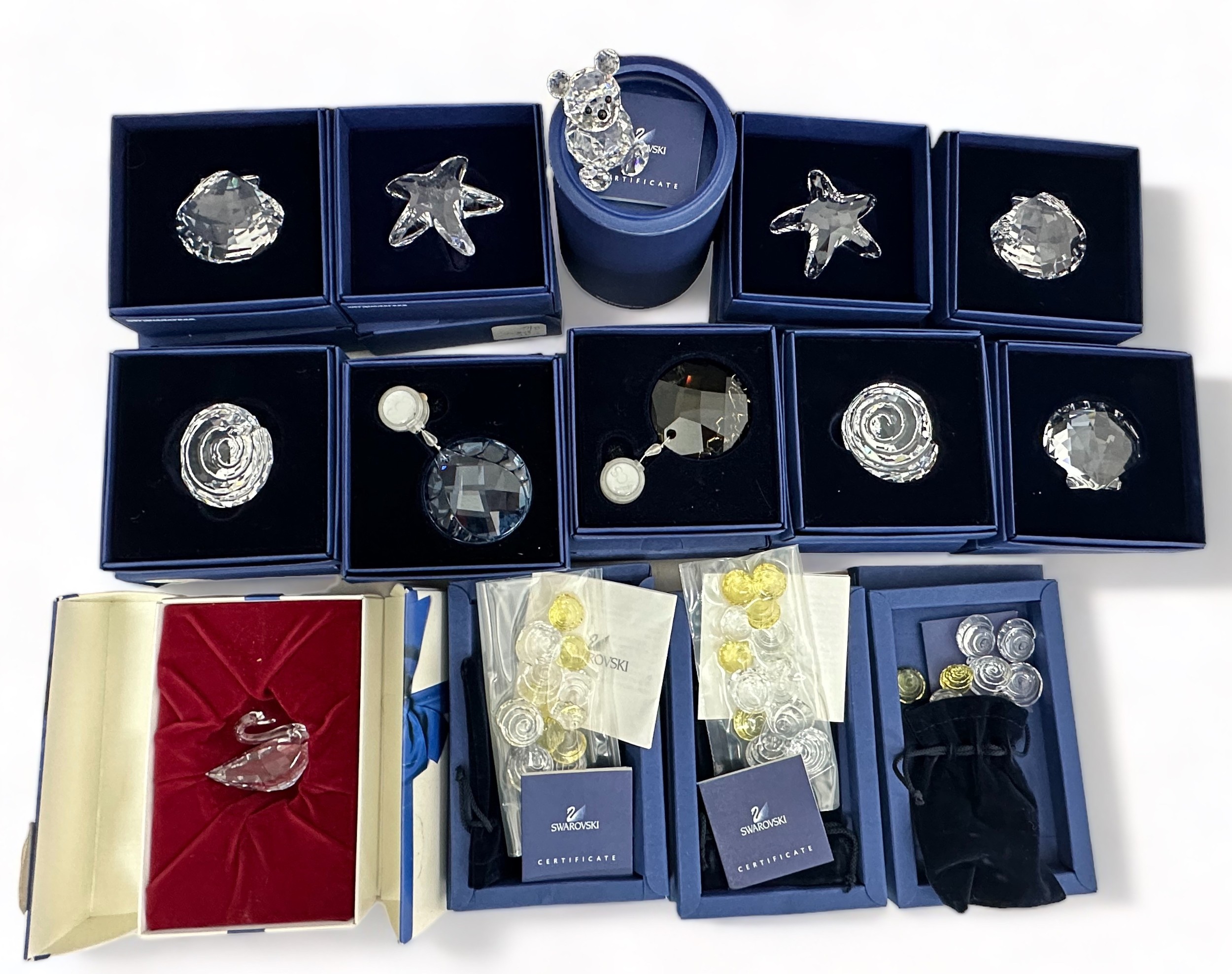 Collection of swarovski crystal animals. Includes 2 x starfish (7400 NR 200 502), 2 x spiral