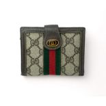 Gucci, Gucci Accessory Collection Sherry Line CG Trifold wallet. Internal gilt stamp for Gucci