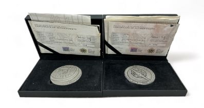 A pair of Royal Mint 2011 Henry VIII 5oz commemorative silver medallions in boxes of issue with