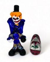 Murano glass clown with Strathearn red flower paperweight.