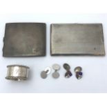 Silver items. Includes- a rectangular cigarette case stamped silver with inscription to inner