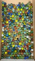 Job lot of assorted Marbles over 550 dating from 1950/60s, assorted sizes colours, one unopened bag.