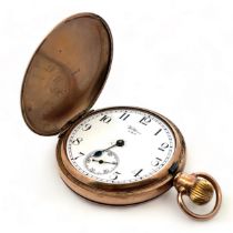 9ct gold Waltham hunter pocket watch. White enamel face with Arabic numeral hour markers, blue steel