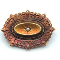 A Victorian mourning brooch with empty glazed panel to reverse and later white metal pin. Length