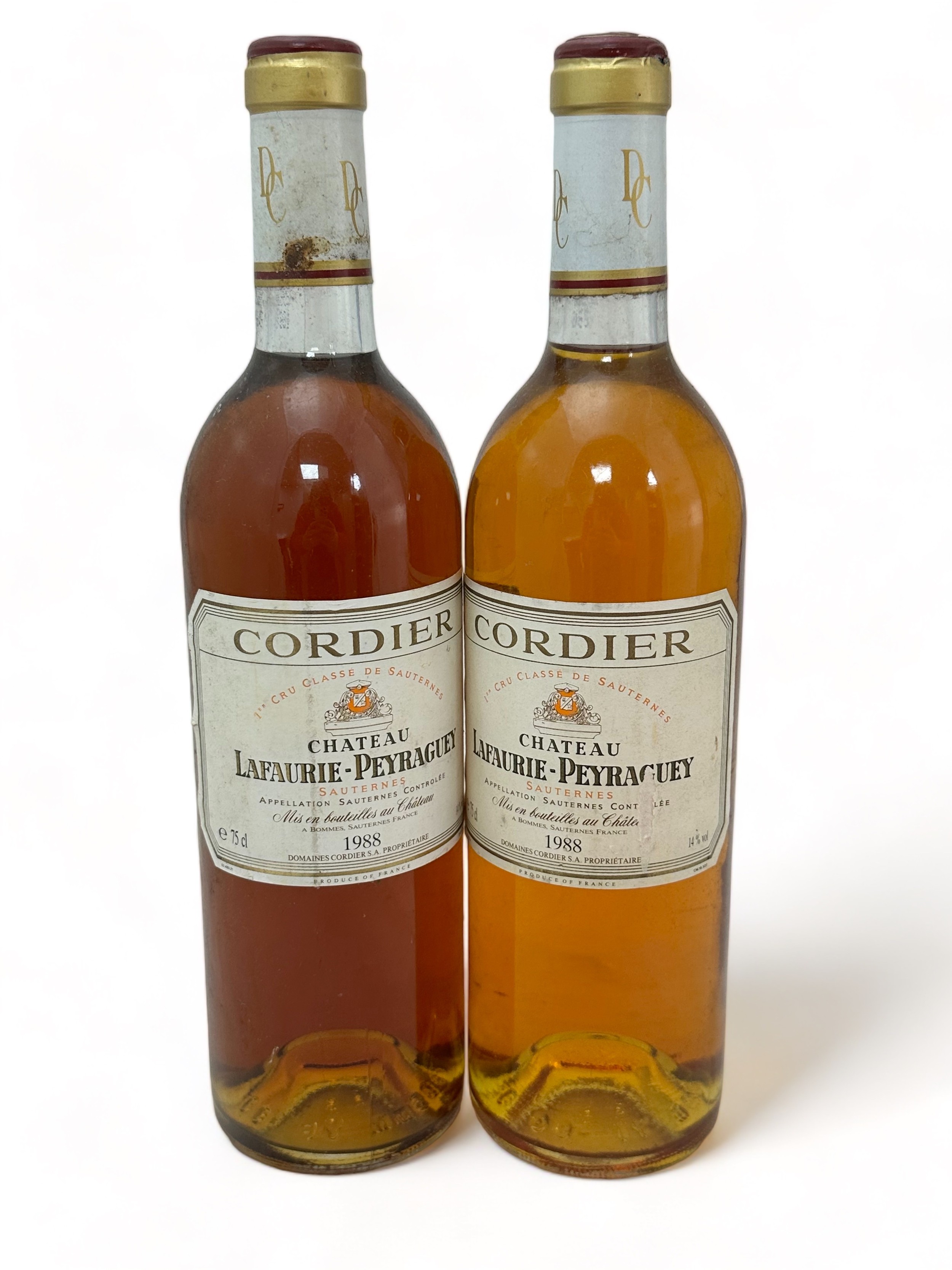 Two bottles of Chateau Lafaurie-Peyraguey Sauternes 1988, 2er cru classé. Damage to labels.