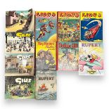 Collection of Children's Annuals to include 1950, 1983 Rupert Annuals, 1954, 55, 56 Lion Annuals,
