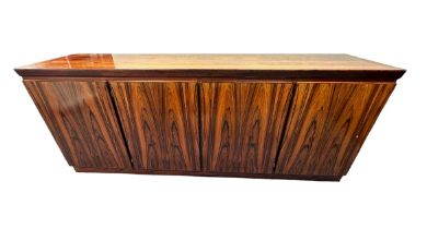 A Rio Rosewood sideboard with four doors, circa 1970, two shelves to right hand cupboard, one