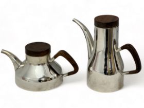 A Robert Welch sterling silver coffee pot and tea pot of plain tapering form with curved spout,