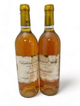 Two bottles of Chateau d’Arche Sauternes 1988, Grand Cru Classe. Damage to labels.
