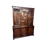 A Mahogany Bridgecraft Display Cabinet with 2 glazed doors and glazed central section to top with