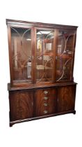 A Mahogany Bridgecraft Display Cabinet with 2 glazed doors and glazed central section to top with