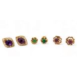 Three pairs of stud earrings, including a pair of amethyst earrings, a pair of emerld earrings and a