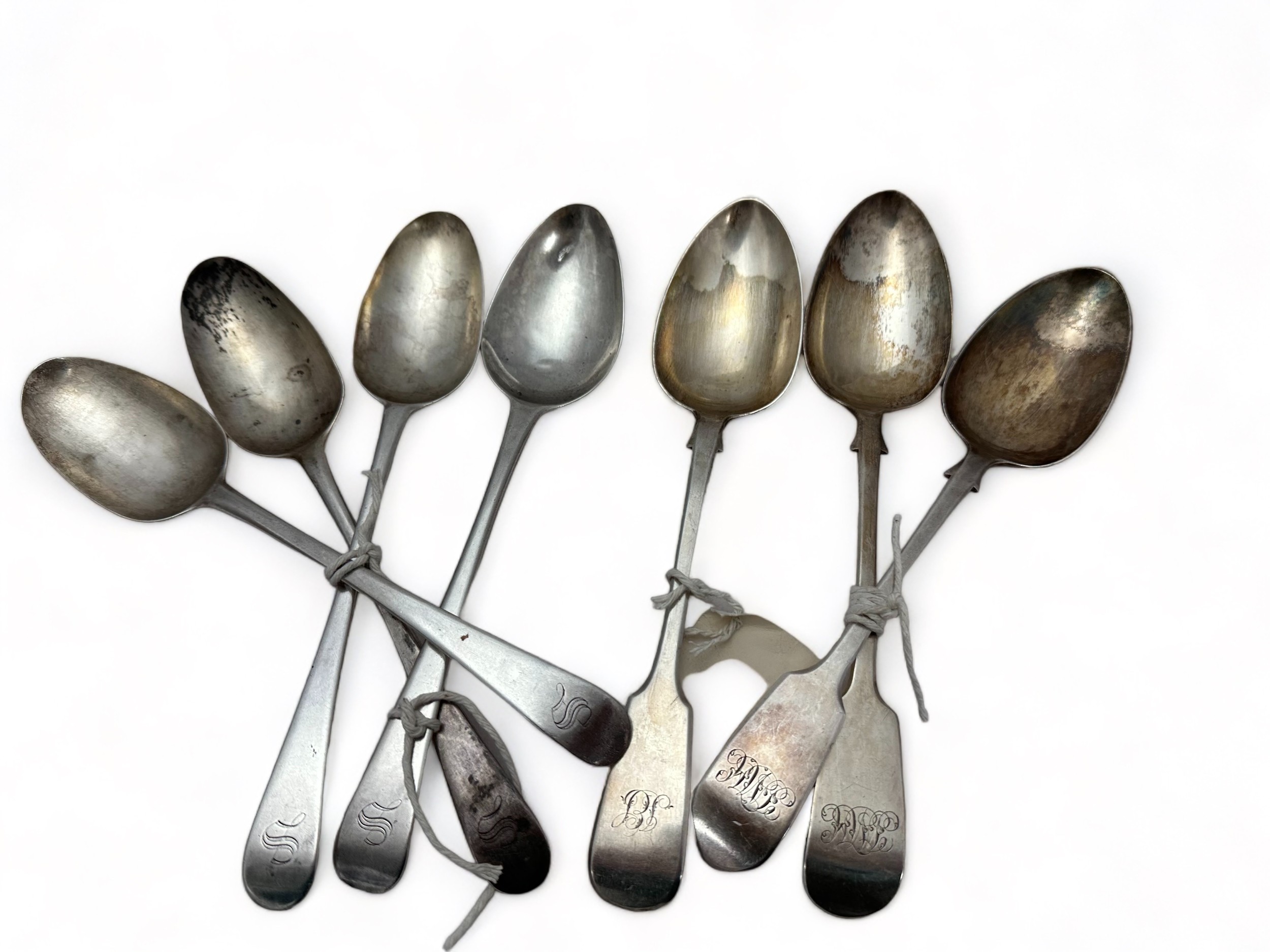 Seven George III/ Victorian silver serving spoons. Includes: two with marks for Charles Shipway,