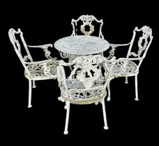 A painted cast metal garden set which comprises of a table decorated with foliage pattern, four