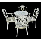 A painted cast metal garden set which comprises of a table decorated with foliage pattern, four