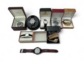 A selection of boxed gents wristwatches (8) with examples by Fossil, Accurist, Raymond Weil,