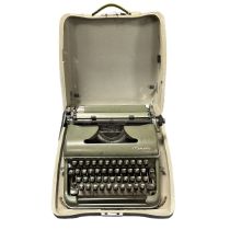 1950s Olympic Deluxe portable manual typewriter, generally good plus (some surface corrosion) in