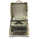 1950s Olympic Deluxe portable manual typewriter, generally good plus (some surface corrosion) in