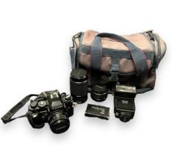Chinon CG-5 Camera with Lenses & Bag. Chinon CG-5 camera body with Auto Chinon 50mm f1.9 lens.