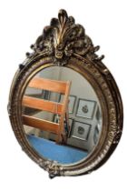 Large 20th Century gilt French style oval mirror. Height 150cm, width 105cm, Overall condition
