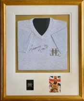 Lennox Lewis (British, b. 1965), autographed grey Lennox Lewis t-shirt with signature to the chest