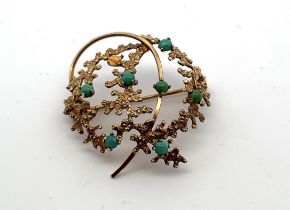 Andreas Daub 9ct gold and turquoise brooch. One stone missing. Dimensions approx 30 mm x 33mm.