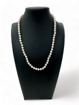A cultured pearl necklace with clasp stamped 375.
