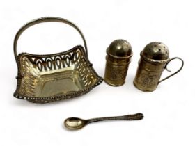 A small silver basket by Colen Hewer Cheshire, Chester, 1909, a silver spoon, and two silver