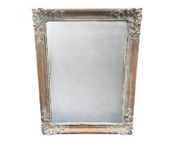 Large ornately framed mirror, 130 x 100cm.