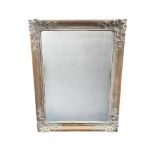 Large ornately framed mirror, 130 x 100cm.