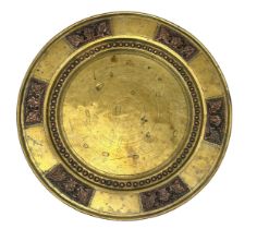 A brass and copper Arts and Crafts style plate. Diameter 29.cm approx.