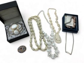 Small assortment of jewellery items. Including a micro mosaic brooch, a Bradford exchange 'Nature'