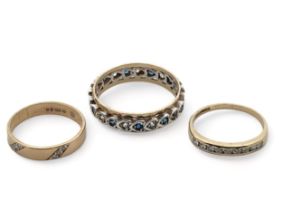 Three rings. A 9ct gold and diamond ring with the 2 sets of three diamonds set in diagonal