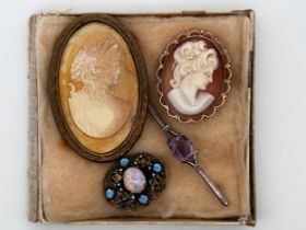 A small collection of jewellery including a 9ct gold cameo brooch (7.72g) and a white metal amethyst