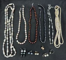 A collection of six cultured pearl necklaces and five pairs of imitation pearl earrings. Please
