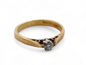 An 18ct gold and diamond ring, diamond approx 0.10ct. Size J. Please see the buyer's terms and
