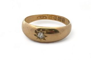 An 18ct gold and old cut diamond gypsy ring , size M. Chester 1913 hallmarks. 3.51g. Please see