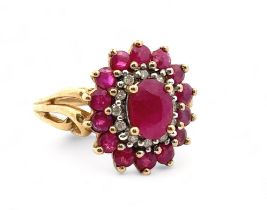 A ruby and diamond 9ct gold cluster ring, size J. Weight 3.74g. Please see the buyer's terms and