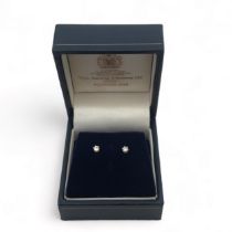 Diamond earrings stamped as 14ct white gold. Approx diamond weight 0.1ct. Please see the buyer's