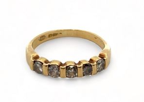An 18ct gold five stone diamond ring, size K.