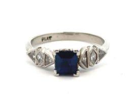 A beautiful Art Deco sapphire and diamond ring, stamped as platinum. Set with a central square