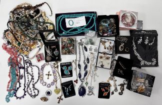 Large quantity of costume and silver jewellery. Includes a silver and ruby necklace, silver pendants