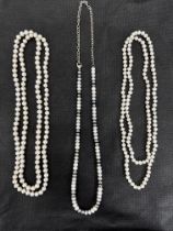 Three cultured pearl necklaces, one with silver clasp. Please see the buyer's terms and conditions